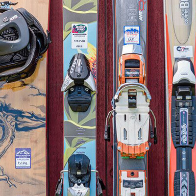 group of skis with stickers