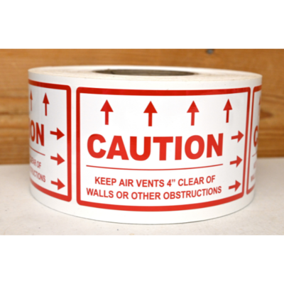 A roll of Caution Keep Air Vents Clear Labels