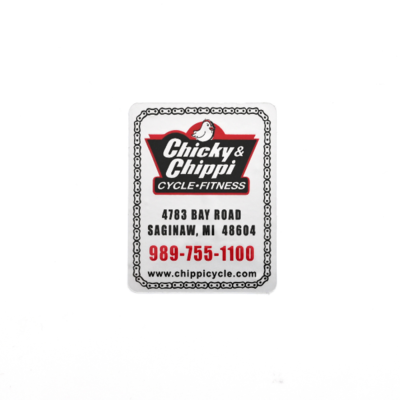 A rectangular white sticker with a border with all the contact information for 'Chicky & Chippi'